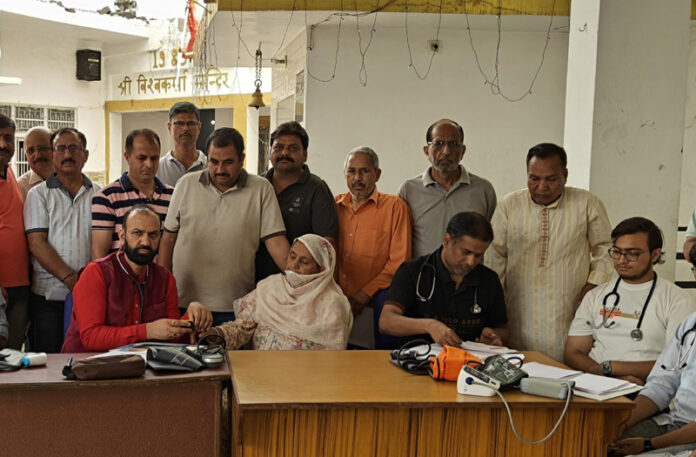 Dr Sushil Sharma and his team during a cardiac awareness cum health check up camp at Bakshi Nagar, Jammu.