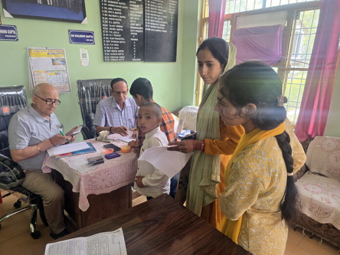 Dignitaries from Hari Prabhu Sanstha distributing scholarships among meritorious Government school students in Jammu on Monday.