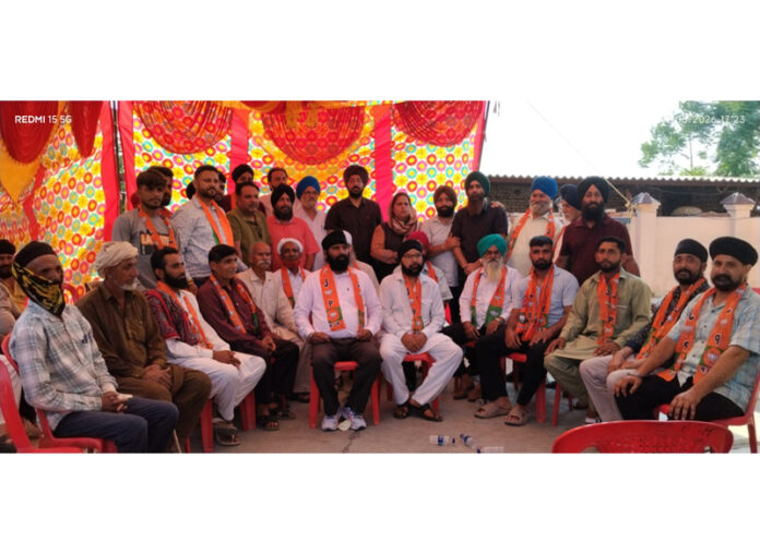 BJP Minority Morcha J&K president Ranjodh Singh Nalwa posing along with others during a function in Jammu.