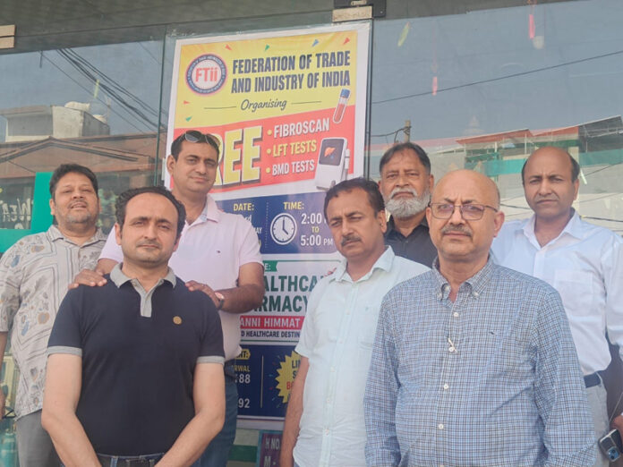 Organizers posing for a group photograph during a health camp at Channi Himmat, Jammu. Organizers posing for a group photograph during a health camp at Channi Himmat, Jammu.