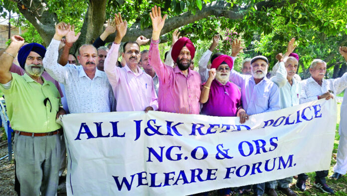 Retired police personnel staging a demonstration in favour of their demands in Jammu on Tuesday. -Excelsior/Rakesh