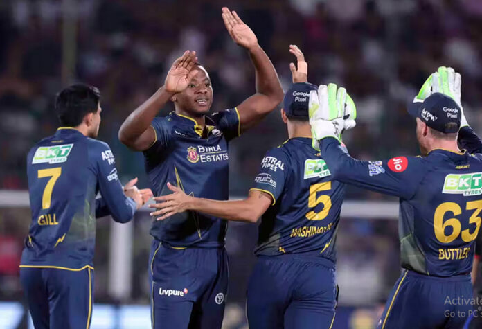 Gujarat Titans player celebrating with teammates after taking a wicket against RR in Jaipur on Saturday. Gujarat Titans player celebrating with teammates after taking a wicket against RR in Jaipur on Saturday.