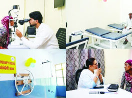 Doctors examining patients at a community health centre on Friday.