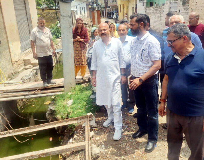 MLA Jammu East , Yudhvir Sethi inspecting development works in his constituency on Tuesday. MLA Jammu East , Yudhvir Sethi inspecting development works in his constituency on Tuesday.
