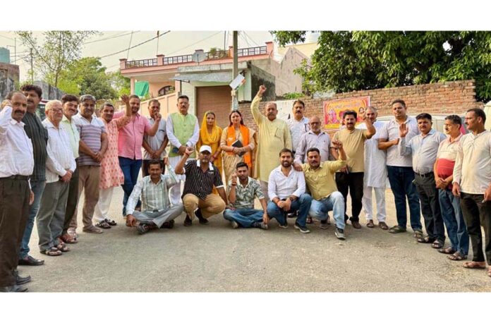 BJP leader, Rekha Mahajan and others posing for a photograph after a meeting in Ghagwal on Thursday.