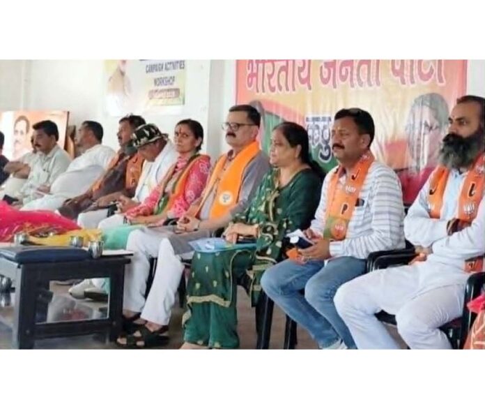 BJP leader Sanjay Kumar Baru along with other party workers in Kathua on Monday.