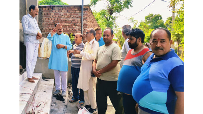 Senior BJP leader and former councillor, Sanjay Baru during his tour to Ward 41 on Thursday.