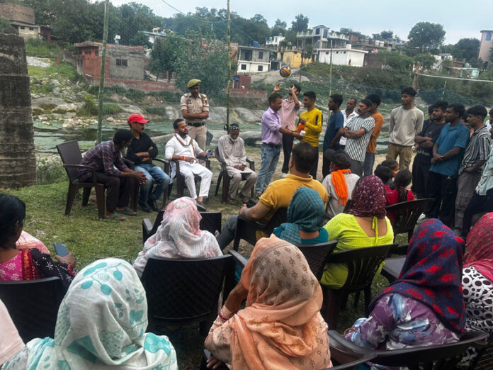 Cong leader Sumeet Magotra interacting with people at Kotli in Udhampur.