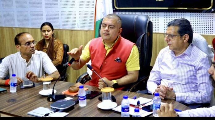 Chief Principal Census Officer Amit Sharma chairing a meeting at Relief and Rehabilitation Commissioner (Migrants) office in Jammu on Thursday.