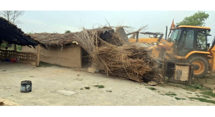 Illegal structure of a drug peddler demolished at Nanke Chak, Samba on Thursday.