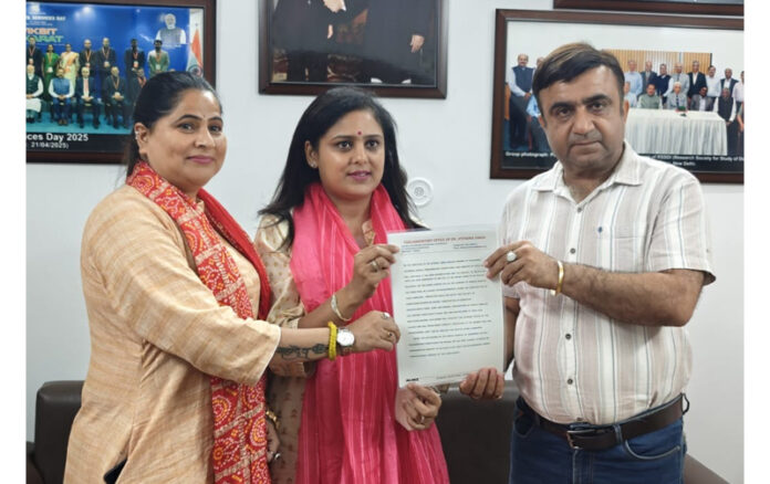 Bharat Sharma, Sansad Pratinidhi of Union Minister and MP, Dr Jitendra Singh handing over letter of works to be executed under MPLAD to Mahila Morcha leaders at Jammu on Thursday. Bharat Sharma, Sansad Pratinidhi of Union Minister and MP, Dr Jitendra Singh handing over letter of works to be executed under MPLAD to Mahila Morcha leaders at Jammu on Thursday.