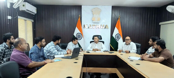 MLA Kathua, Dr Bharat Bhushan reviewing development works of his constituency with officers of PWD on Tuesday.