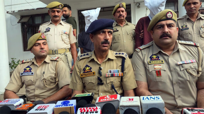 DySP Headquarters, Kathua Ravinder Singh along with other police officers at a press conference at Kathua on Saturday. -Excelsior/Nishant