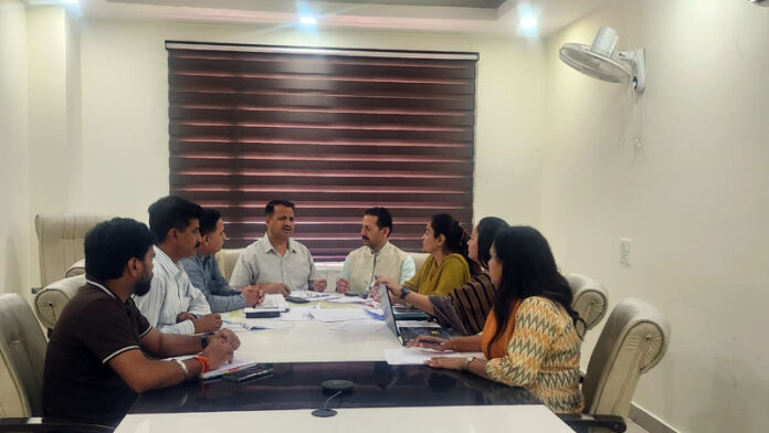 BJP leader Rakesh Mahajan chairing a meeting in Jammu on Wednesday. BJP leader Rakesh Mahajan chairing a meeting in Jammu on Wednesday.