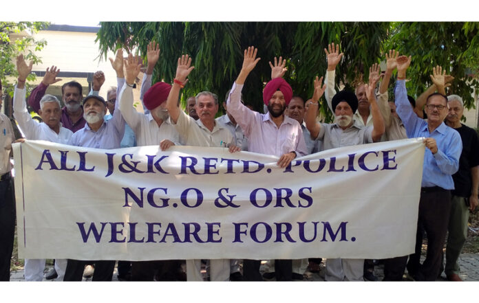 Members of Retired Police Welfare Forum staging a protest in Jammu. -Excelsior/Rakesh