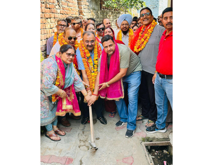 MLA Bahu, Vikram Randhawa kick starting construction work of lane and drain in Ward number 47. MLA Bahu, Vikram Randhawa kick starting construction work of lane and drain in Ward number 47.