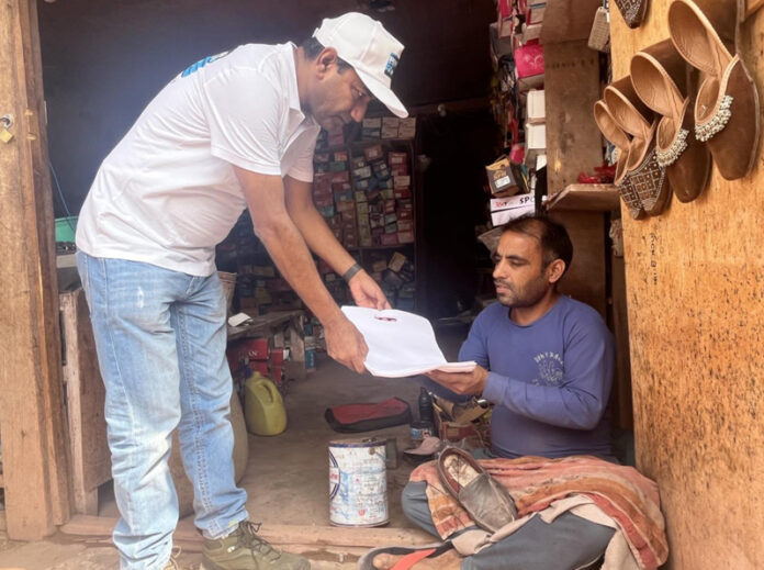 Dinabandhu Boral, Head of Project (HoP), Sawalkote HE Project presenting a cap to a person in Ramban. Dinabandhu Boral, Head of Project (HoP), Sawalkote HE Project presenting a cap to a person in Ramban.