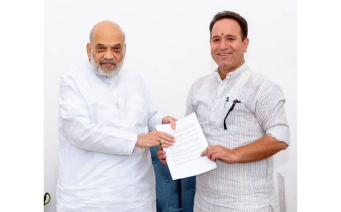 LoP in J&K Legislative Assembly, Sunil Sharma presenting a memorandum to Union Home Minister Amit Shah in New Delhi. LoP in J&K Legislative Assembly, Sunil Sharma presenting a memorandum to Union Home Minister Amit Shah in New Delhi.