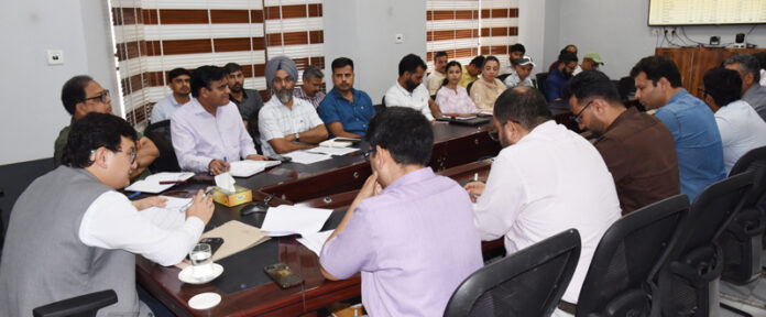 DC Udhampur reviewing progess of RDD schemes.