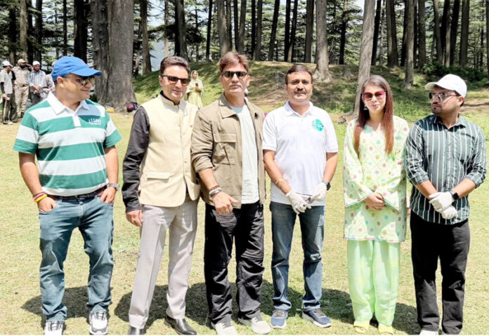 Officers of Tourism Deptt during cleanliness drive at Patnitop.