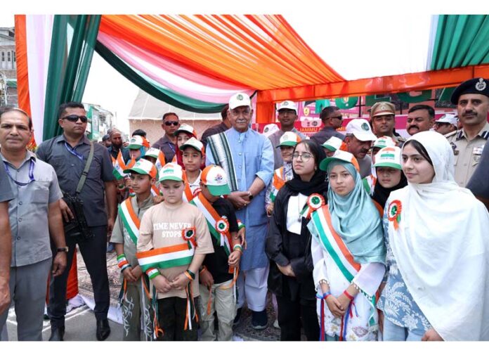LG Manoj Sinha during a padyatra under the Nasha Mukt J&K Abhiyan in Kulgam on Monday. -Excelsior/Shakeel