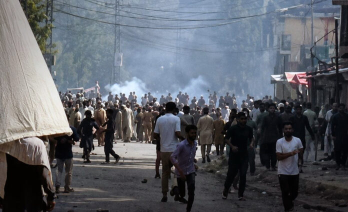 Protestors clashing with security personnel in Pakistan occupied Jammu & Kashmir. Protestors clashing with security personnel in Pakistan occupied Jammu & Kashmir.