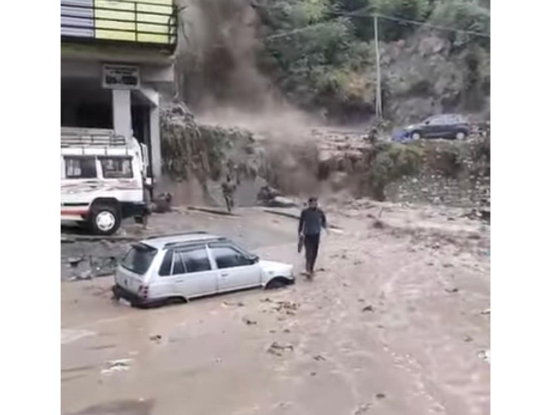 A car trapped in debris in Thathri, Doda after flash floods hit the area on Tuesday. -Excelsior/Ajay Shan