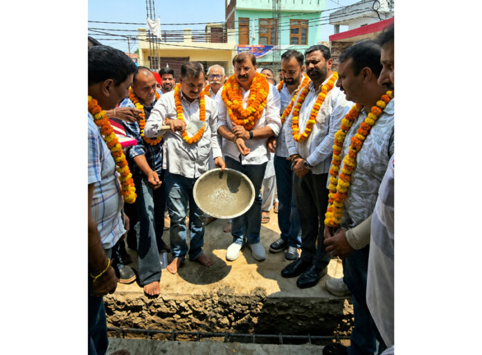 MLA, Jammu West, Arvind Gupta kick starting upgradation work of Sant Kabir Sabha building on Tuesday. MLA, Jammu West, Arvind Gupta kick starting upgradation work of Sant Kabir Sabha building on Tuesday.