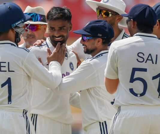 India's Manav Suthar celebrating with teammates after taking the wicket of Afghanistan's Abdul Malik.