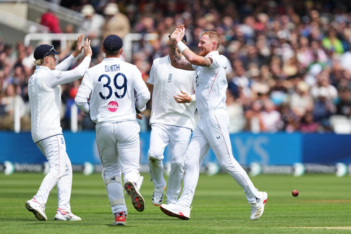 England's captain Ben Stokes celebrating with teammates. England's captain Ben Stokes celebrating with teammates.