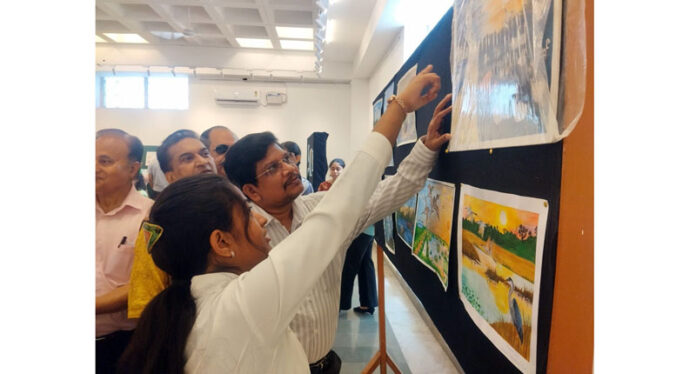 Visitors witnessing an exhibition in Jammu. Visitors witnessing an exhibition in Jammu.