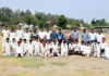 Players posing along with dignitaries during a programme.