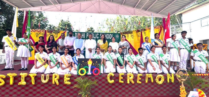 Newly elected students council of DPS Nagbani posing along with dignitaries.