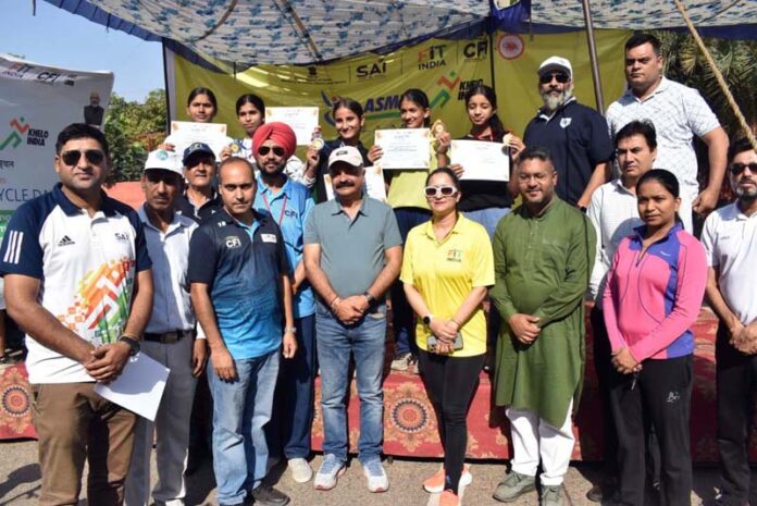 Dignitaries posing along with winners during a programme. Dignitaries posing along with winners during a programme.