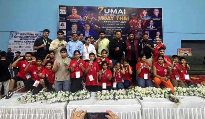 Players posing along with dignitaries during a programme.