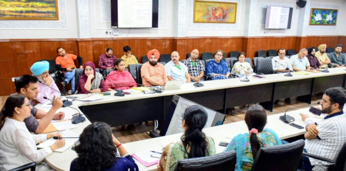 DM Jammu chairing a meeting on Wednesday.