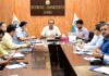 Div Com Ramesh Kumar chairing a meeting at Jammu on Thursday.