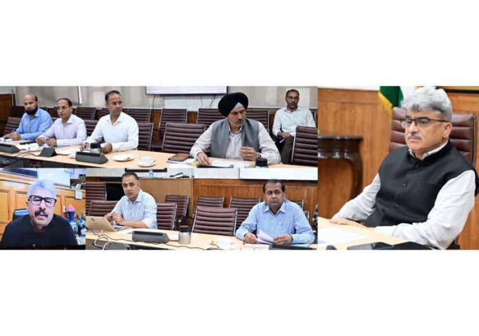 CS Atal Dulloo chairing a meeting at Srinagar on Tuesday. CS Atal Dulloo chairing a meeting at Srinagar on Tuesday.