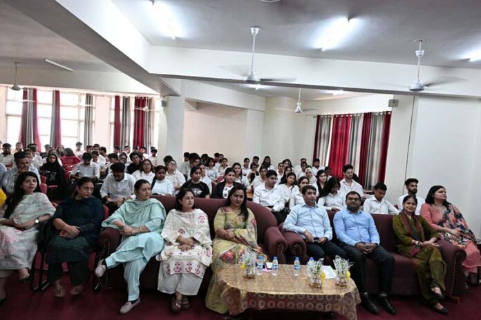 Guests and participants during panel discussion by JU Law School.
