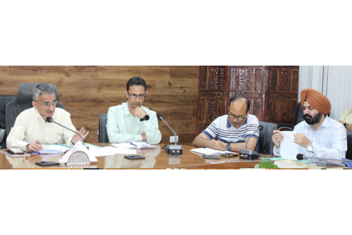 DC Doda chairing a meeting. DC Doda chairing a meeting.