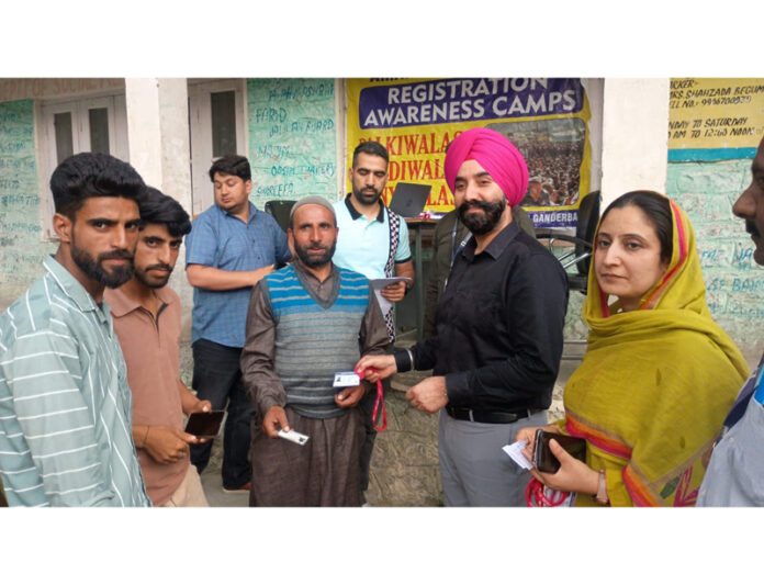 Labour Commissioner, Charandeep Singh distributing RFID cards among registered service providers for Amarnath Yatra. Labour Commissioner, Charandeep Singh distributing RFID cards among registered service providers for Amarnath Yatra.