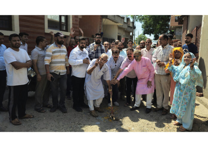 MLA Jammu West, Arvind Gupta kick starting work of lane and drain project in Ward 39 on Monday. MLA Jammu West, Arvind Gupta kick starting work of lane and drain project in Ward 39 on Monday.