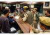 Cops during a raid at a hotel in Pahalgam. -Excelsior/Sajad Dar