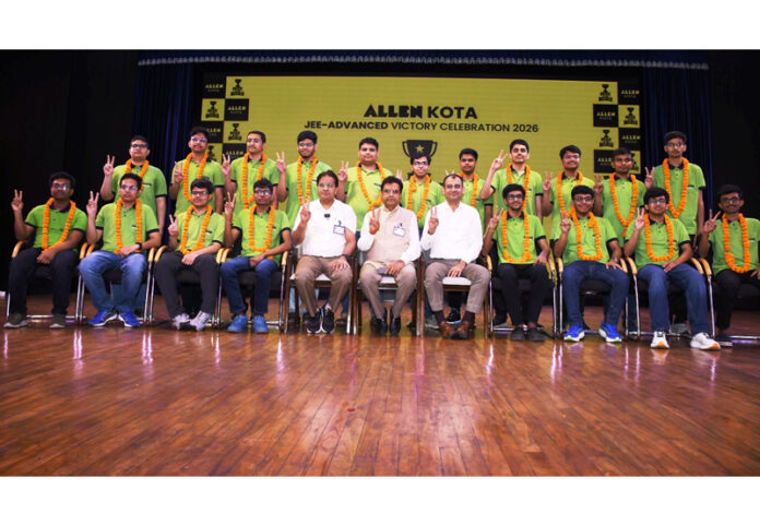 Topper students of Allen Career Institute along with others posing for a group photograph. Topper students of Allen Career Institute along with others posing for a group photograph.