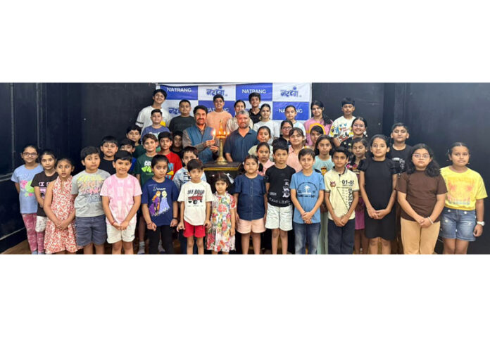 Children along with others at the start of Natrang Summer Theatre Camp-2026 in Jammu on Friday.