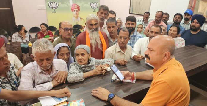 MLA from Jammu East, Yudhvir Sethi listening people’s grievances at a Public Darbar at Jammu on Thursday.